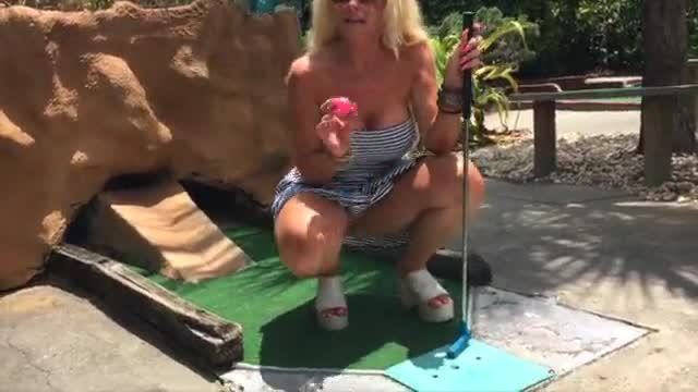 Hot blonde "kelley cabbana" fingers pussy in public mini golf